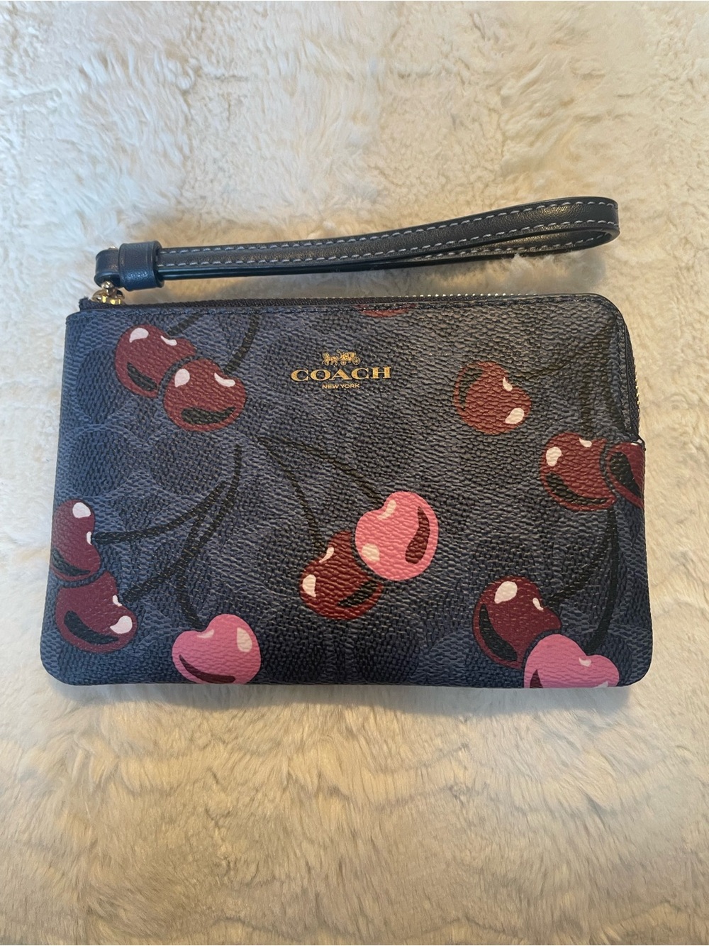 COACH Navy Cherry Print Wristlet with Pink & Red Accents
